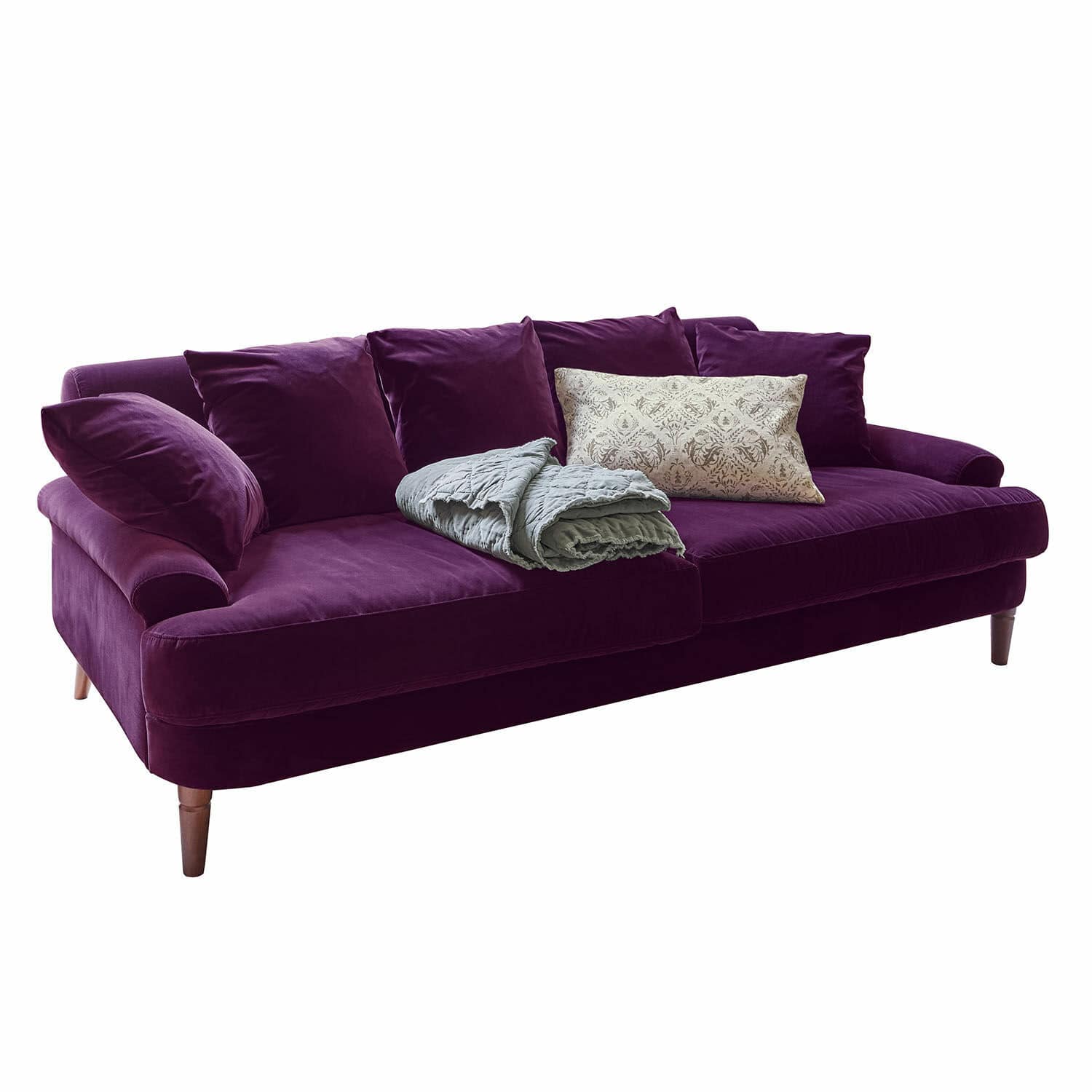 Sofa Rivermere Fioletowa welurowa sofa z poduszkami i szarym kocem, nowoczesny mebel wypoczynkowy do salonu