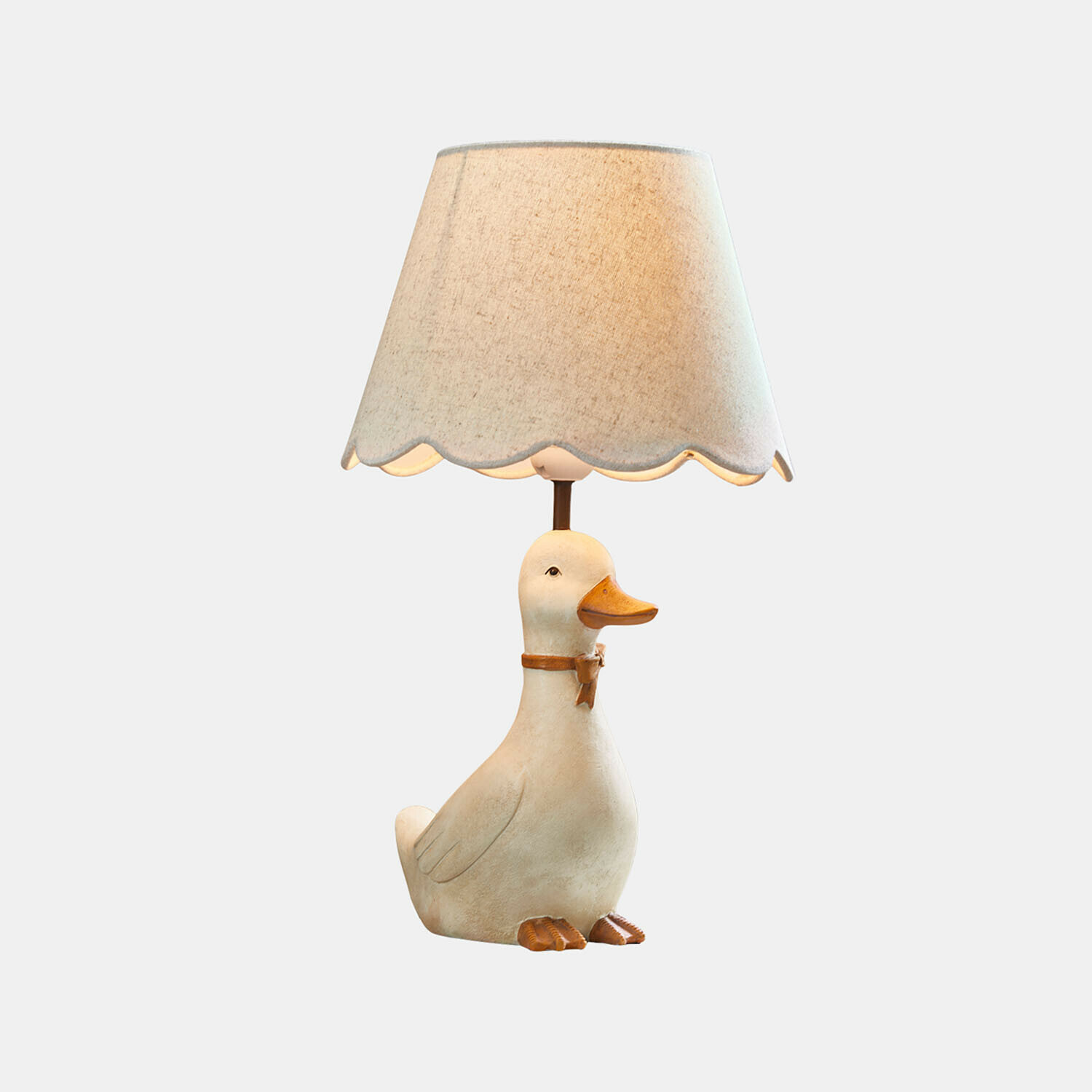 Lampa do pokoju dziecięcego Tillyboo Lampka stołowa z abażurem i podstawą w kształcie białej kaczki z pomarańczowym dziobem