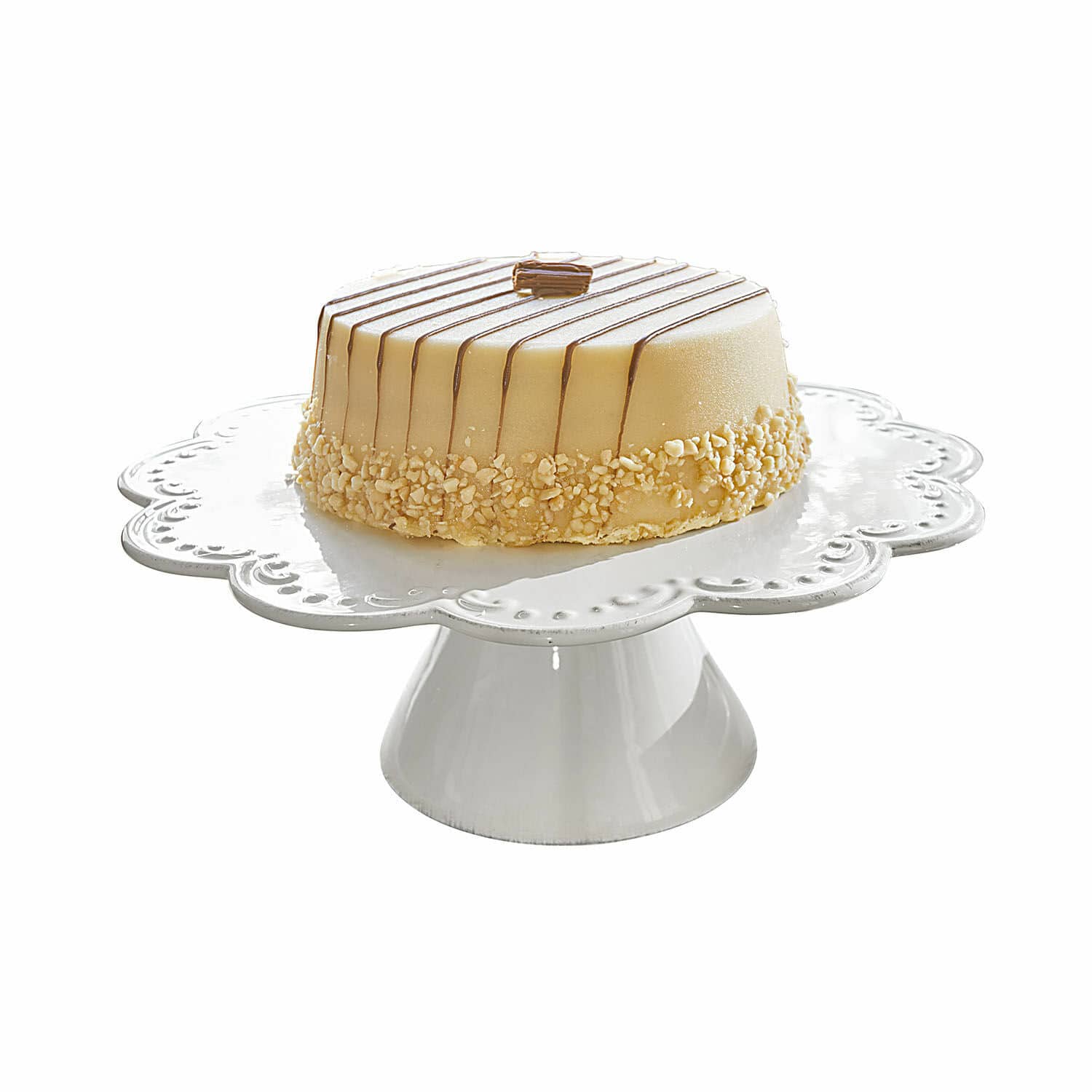 Patera na tort Fontienne Tort na białym ceramicznym stojaku z kremowym lukrem i posypką orzechową, deser na przyjęcie