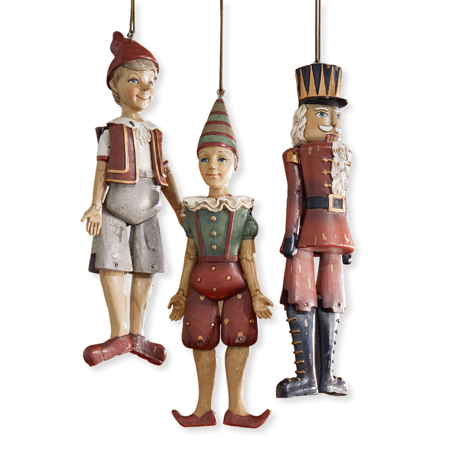 Figurka, zestaw 3 szt. Udine Zestaw trzech drewnianych zawieszek w stylu vintage: Pinokio, klaun i żołnierz w czerwonych i zielonych kolorach