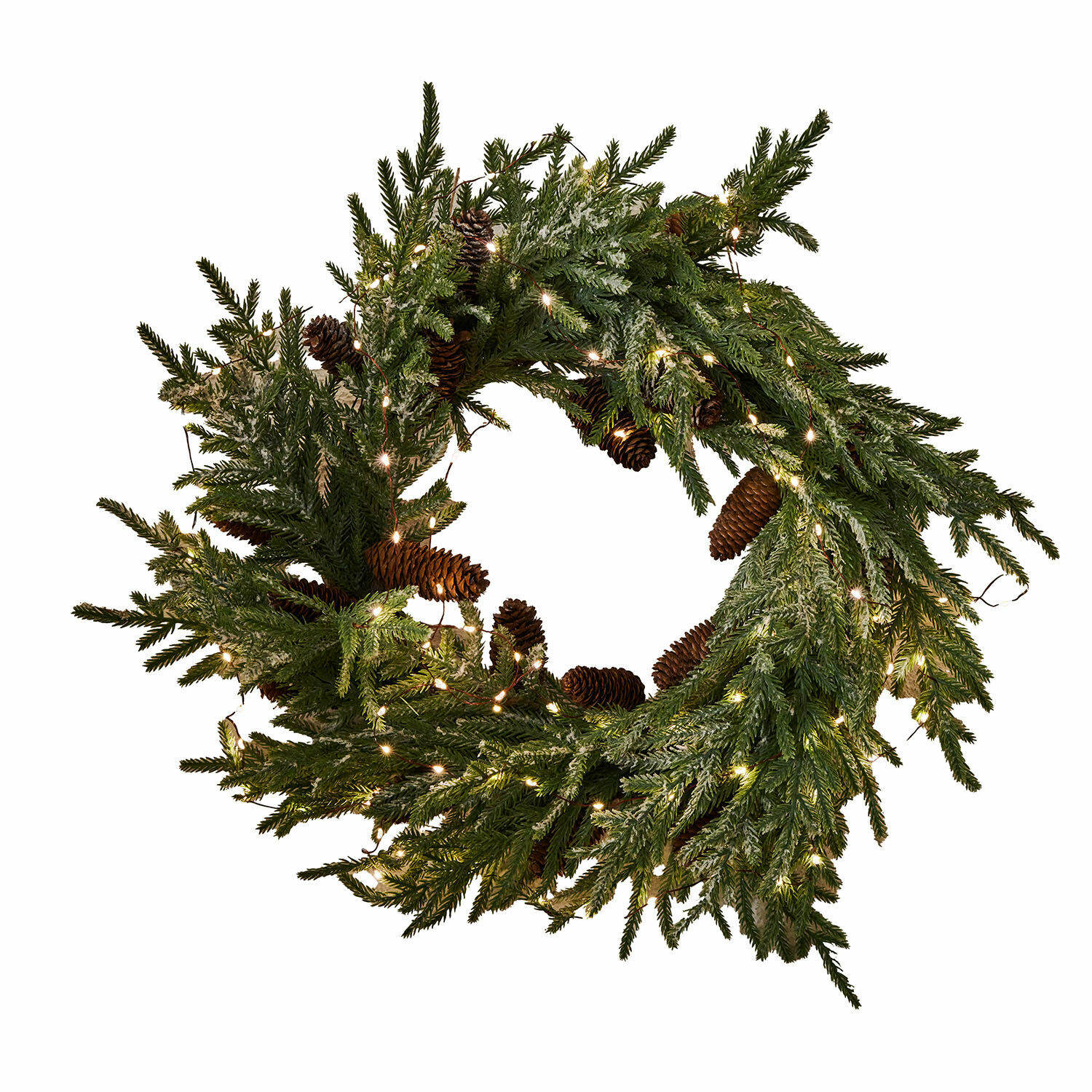 Świąteczny wieniec z zielonych gałązek i szyszek z delikatnym oświetleniem LED na dekorację domu