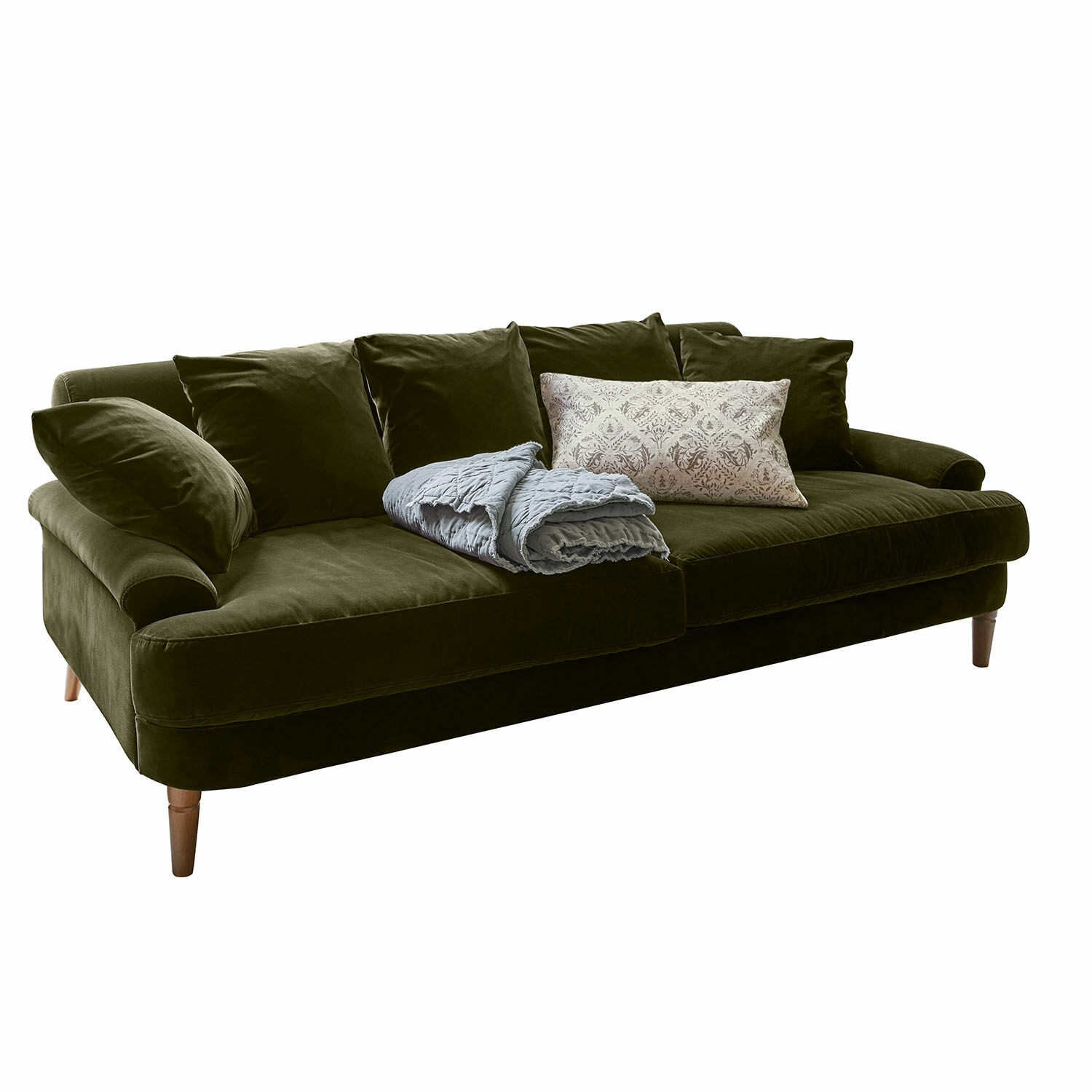 Sofa Rivermere Zielona aksamitna sofa z poduszkami i jasnym kocem, wygodny mebel do salonu