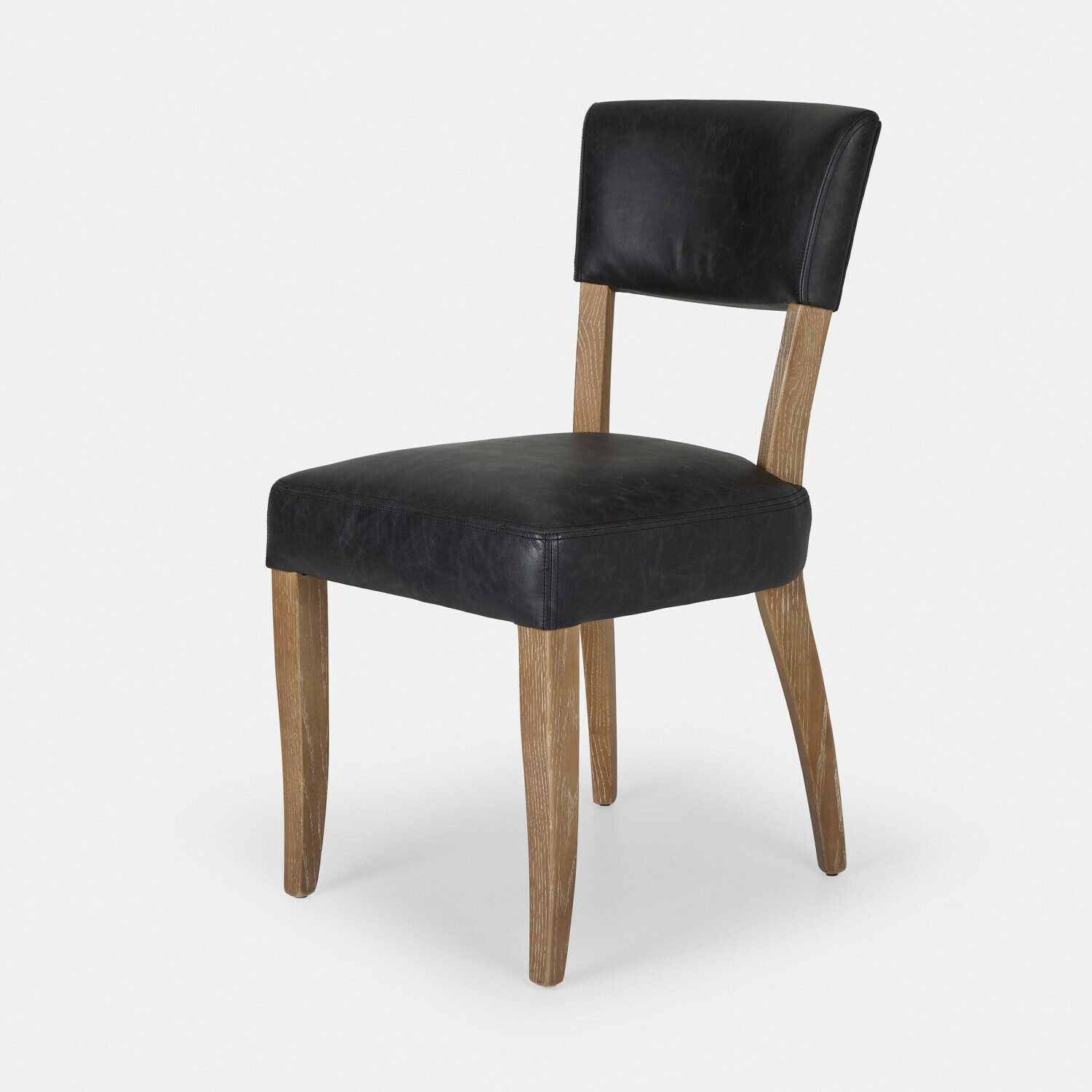 Krzesło Norevaux Krzesło z czarnej skóry i drewnianymi nogami, nowoczesny design do jadalni lub biura